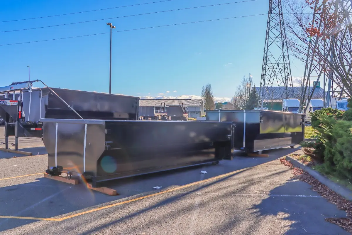 Roll-off dumpster ready for waste disposal at job site for 15 Yard Dumpster Rental in Aransas Pass
